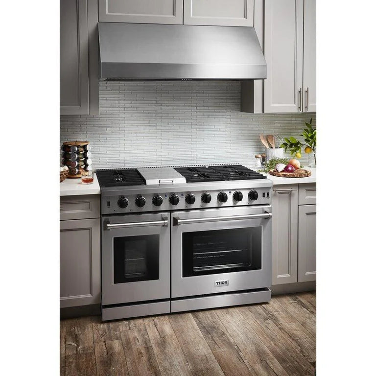 Closed front view of Thor 48-Inch Gas Range LRG4807U, showcasing Dual Ovens, 15,000 BTU Griddle, Italian-Made Burners, and Stainless Steel Finish in modern kitchen setting 