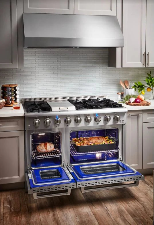 Front far view of the Thor Kitchen Range 48-inch, 6.7 cu. ft. Professional Natural Gas Range in Stainless Steel, HRG4808U, with the oven door open and loaded inside, set in a modern kitchen