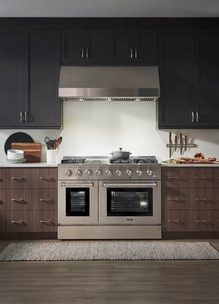 Front view of the Thor Kitchen Range 48-inch, 6.7 cu. ft. Professional Natural Gas Range in Stainless Steel, HRG4808U, set in a modern kitchen